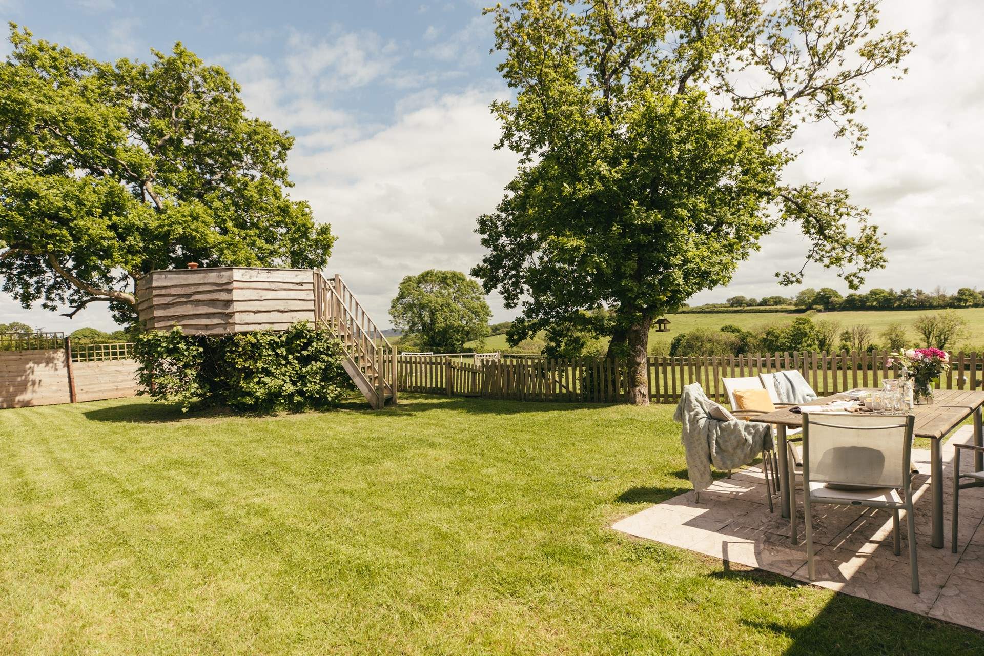 A garden for all the family to enjoy with glorious views of the rolling hills around.