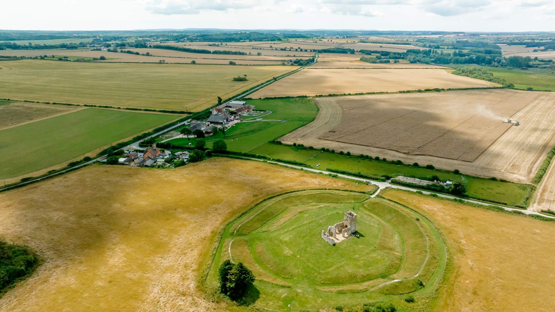 The Old Dairy is the farthest building visible in the photograph (there are 4 polytunnels now in situ housing goats). Knowlton Church is a short distance away.