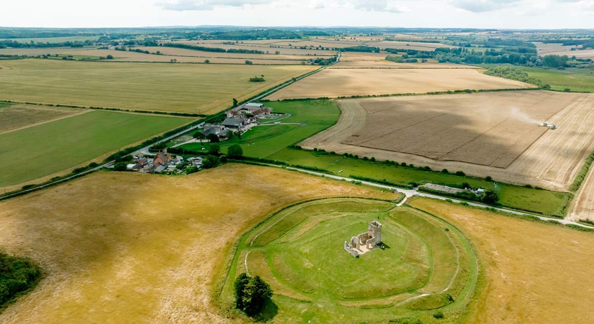 The Old Dairy is the farthest building visible in the photograph (there are 4 polytunnels now in situ housing goats). Knowlton Church is a short distance away.