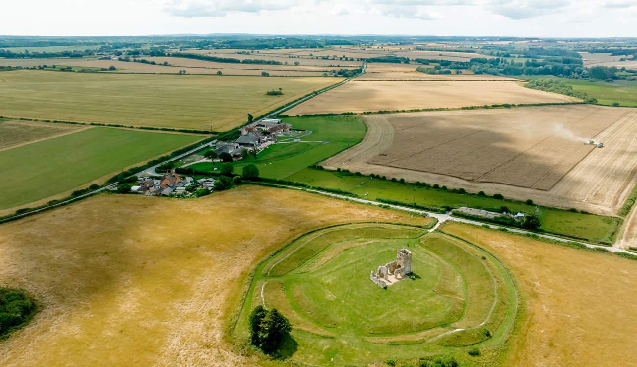 The Old Dairy is the farthest building visible in the photograph (there are 4 polytunnels now in situ housing goats). Knowlton Church is a short distance away.
