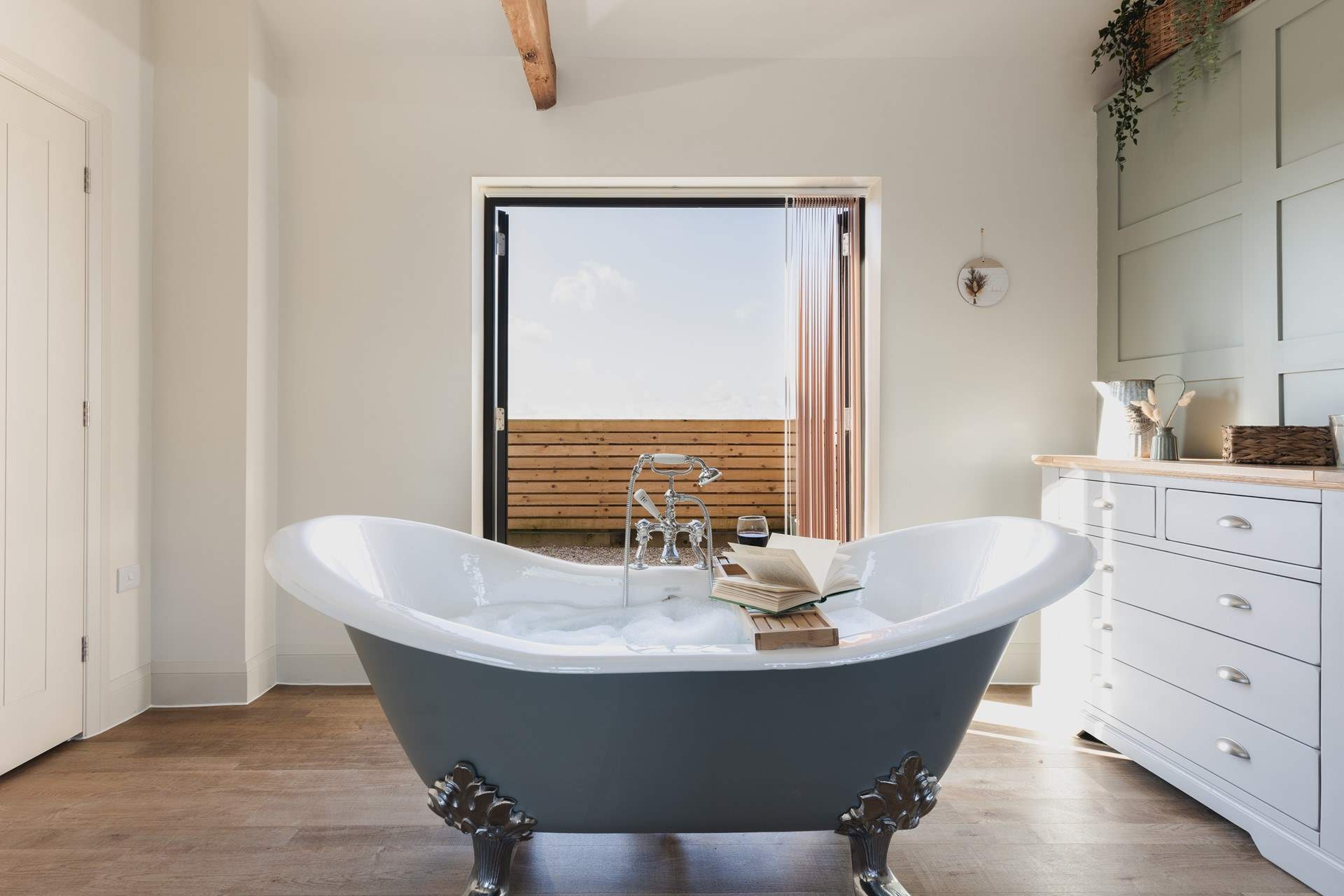 Enjoy a long soak in the wonderful roll-top bath.