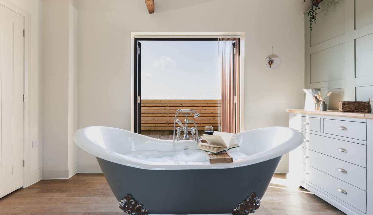 Enjoy a long soak in the wonderful roll-top bath.