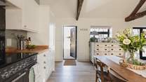 The front stable-door leads out to the parking-area.