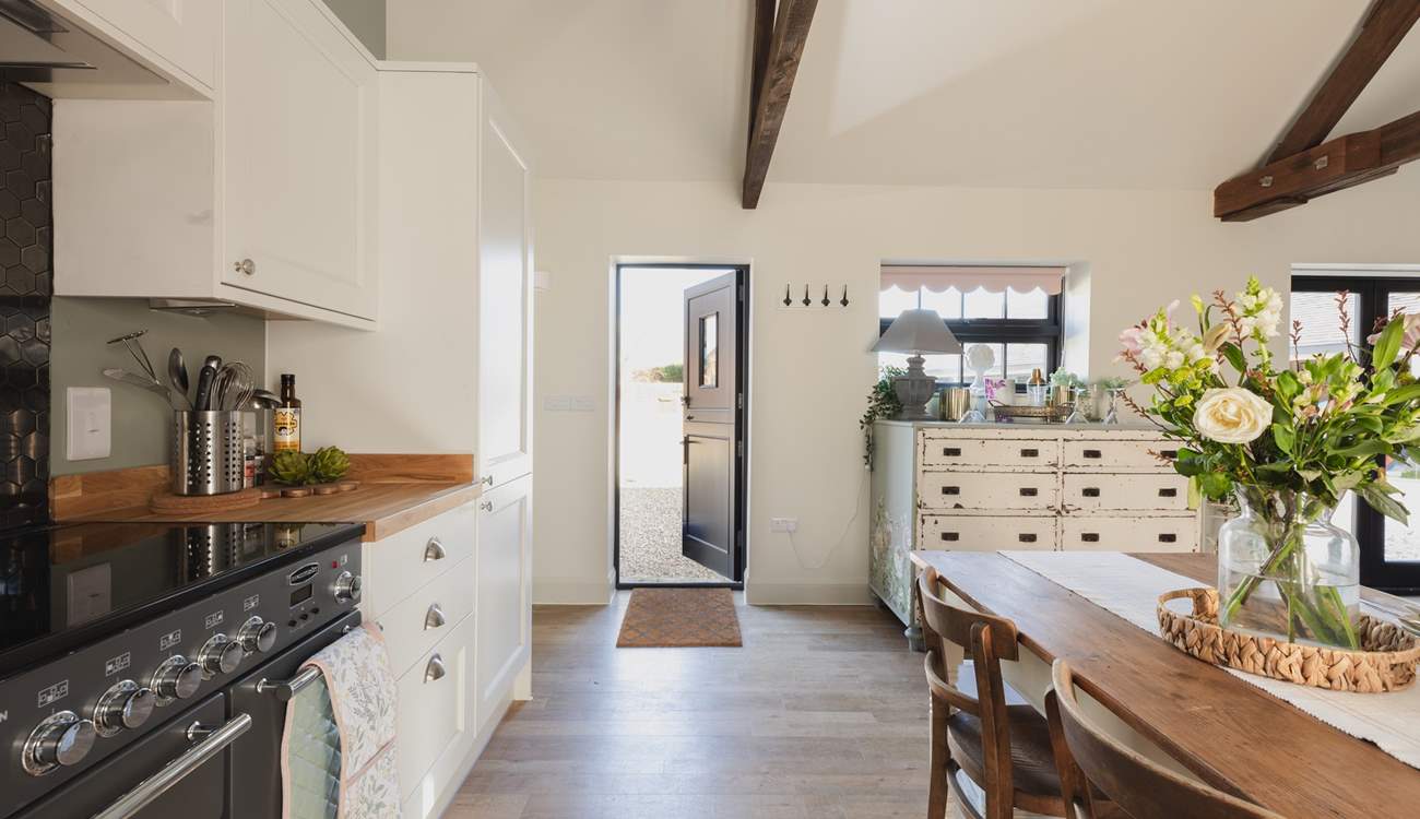 The front stable-door leads out to the parking-area.