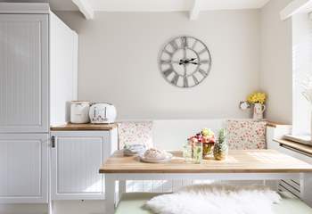 This breakfast table in the kitchen makes it feel a very sociable place.