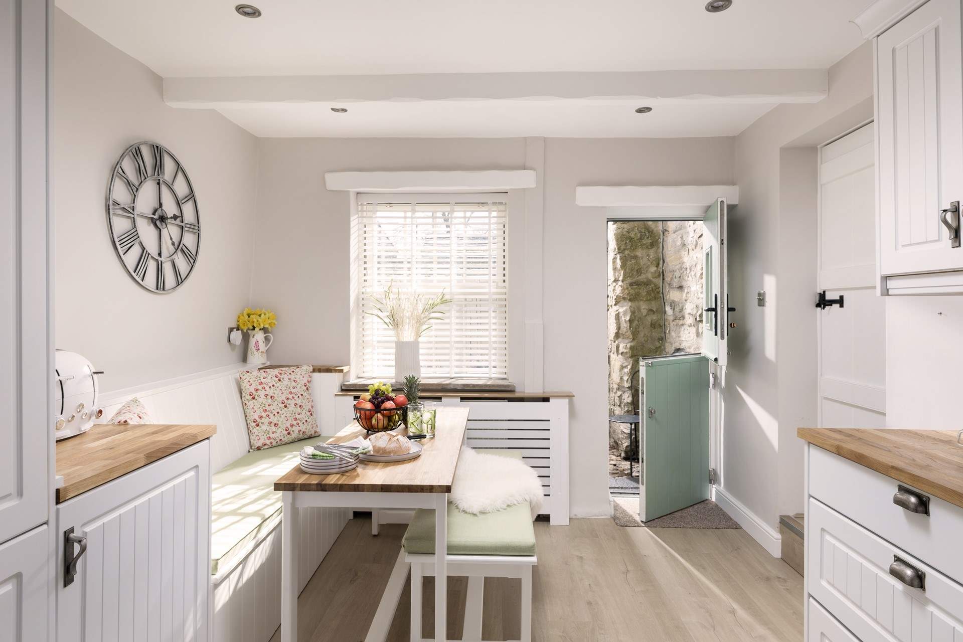The sunny dining kitchen is great for breakfasting together.