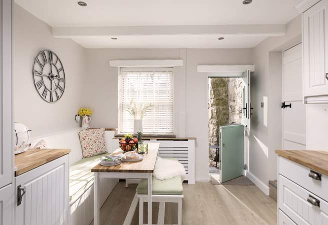 The sunny dining kitchen is great for breakfasting together.