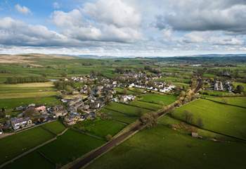 The Yorkshire village from the air, with the hills in the background.