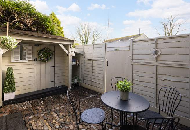 The rear courtyard is ideal for sipping your drink at any time of day.