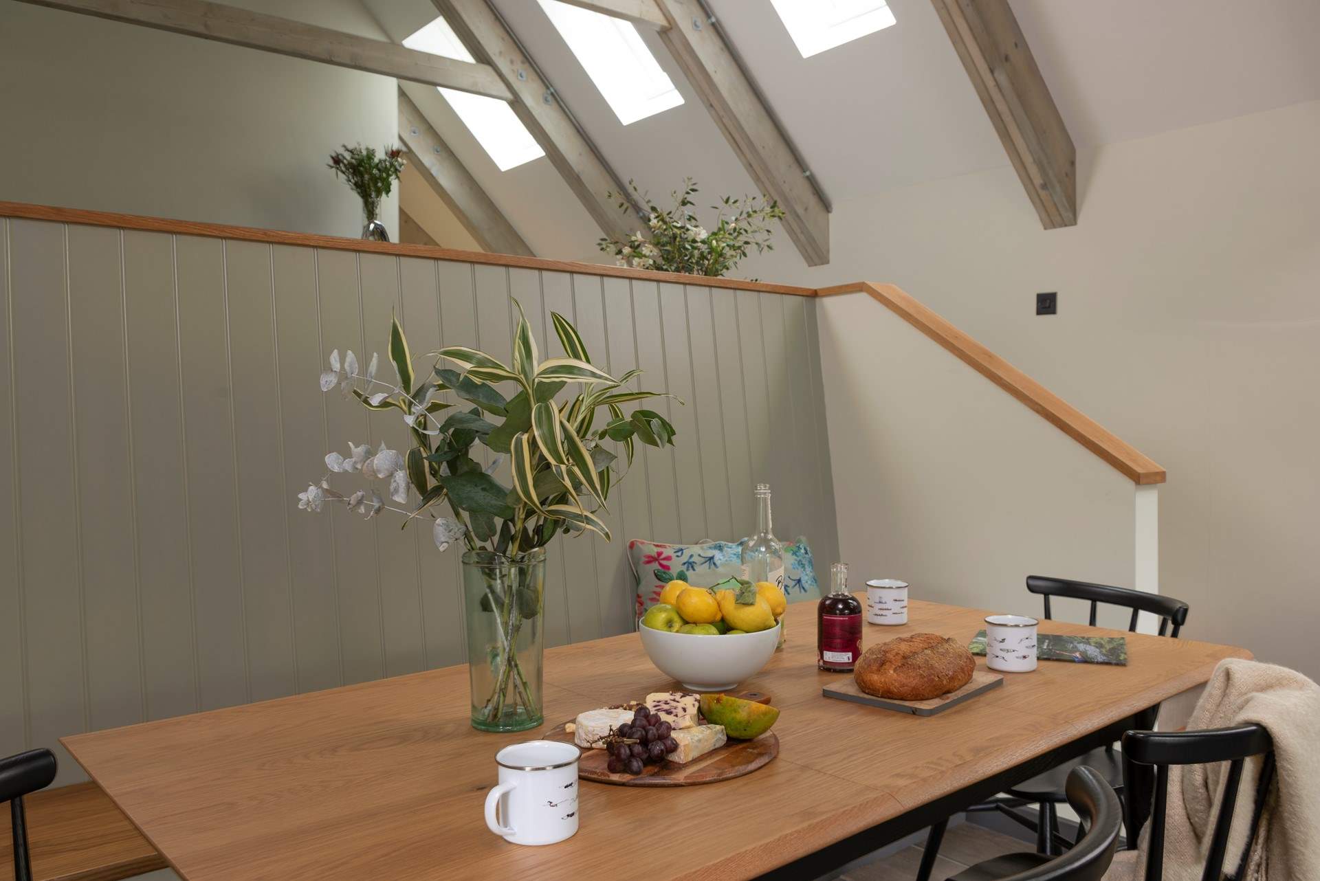 A serene neutral palette complements the unparalleled location of this fabulous former boathouse.