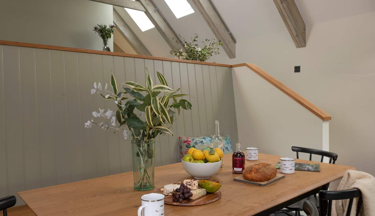 A serene neutral palette complements the unparalleled location of this fabulous former boathouse.