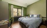 Bedroom 1 will have you feeling like you are in the treetops and can be made as king-size double or 2'6