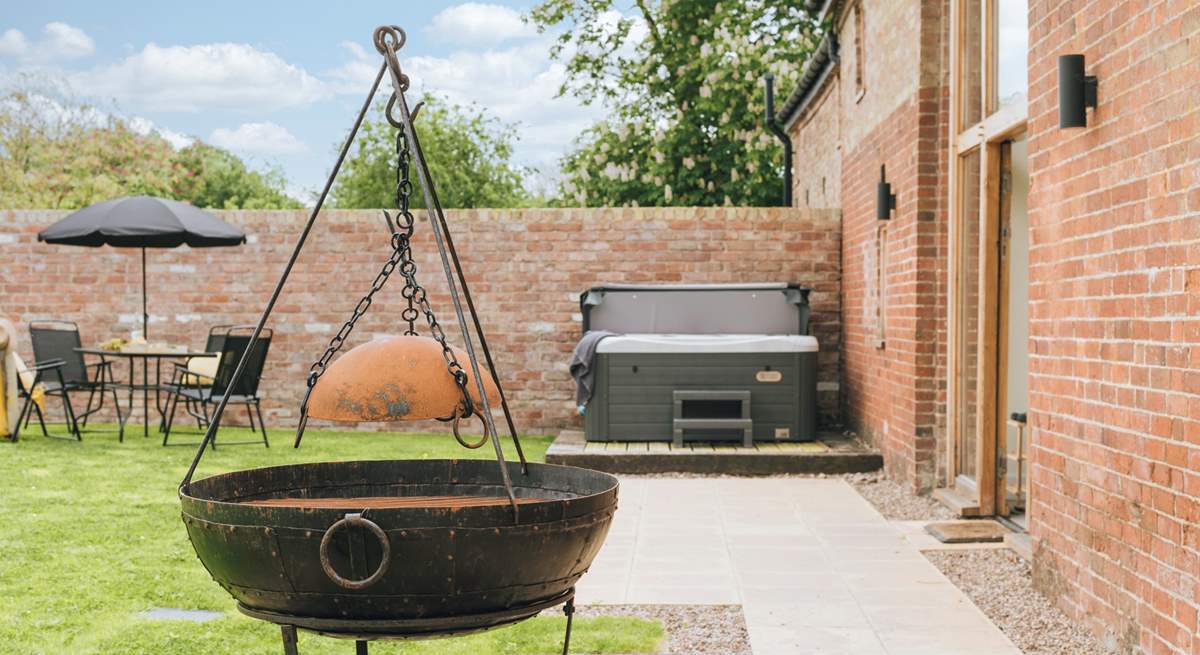 Why not cook up a feast in this fabulous barbecue, complete with wok attachment.