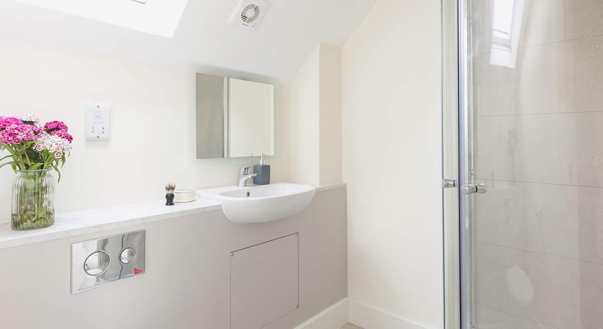 There are modern en suite shower-rooms in both of the upstairs bedrooms.