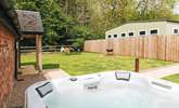 Indulge in the hot tub and enjoy your beautiful private garden. - Thumbnail Image