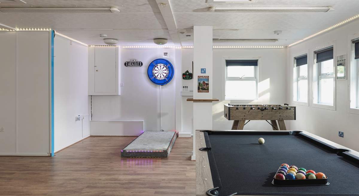 Have fun in the a spacious games-room complete with pool table, table football and darts.