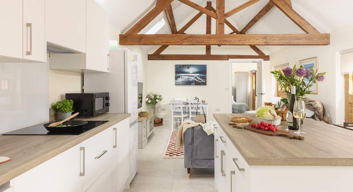 Enjoy the beautiful exposed beams in the open plan living-room.