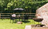 Dine in style with a quirky fire-pit barbecue whilst being surrounded by beautiful woodland. - Thumbnail Image