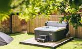 There is even a luxurious private hot tub for you to enjoy. - Thumbnail Image