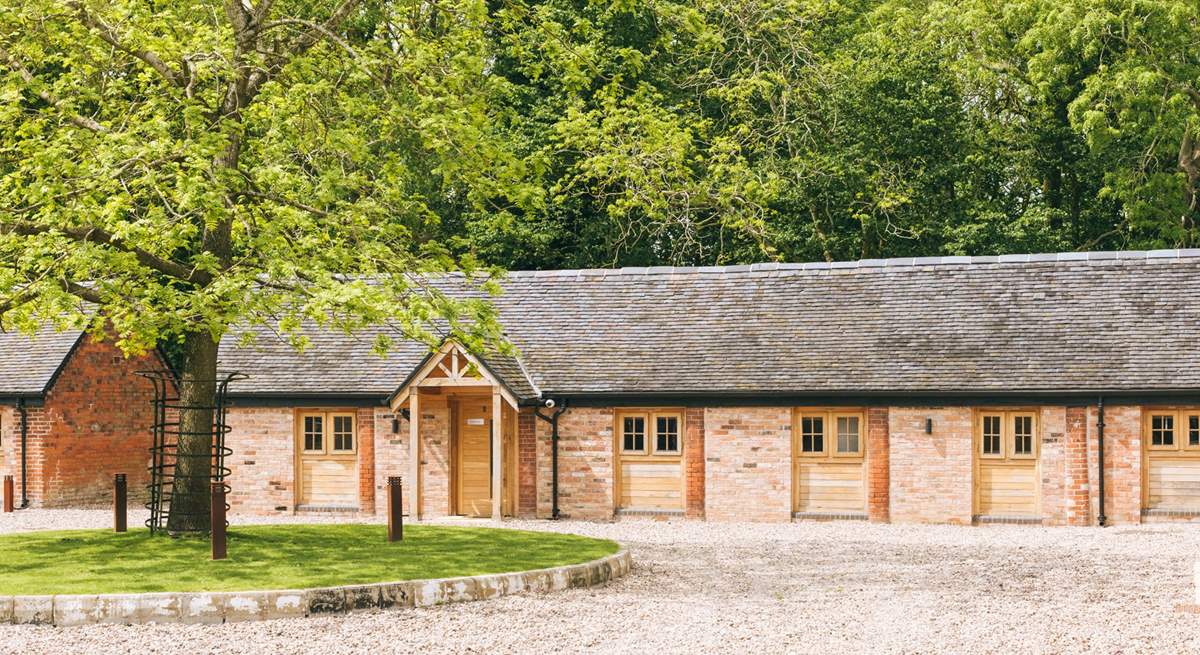 Coach House is one of a collection of five captivating barn conversions encircling a shared gravel courtyard which is anchored by a majestic old tree.