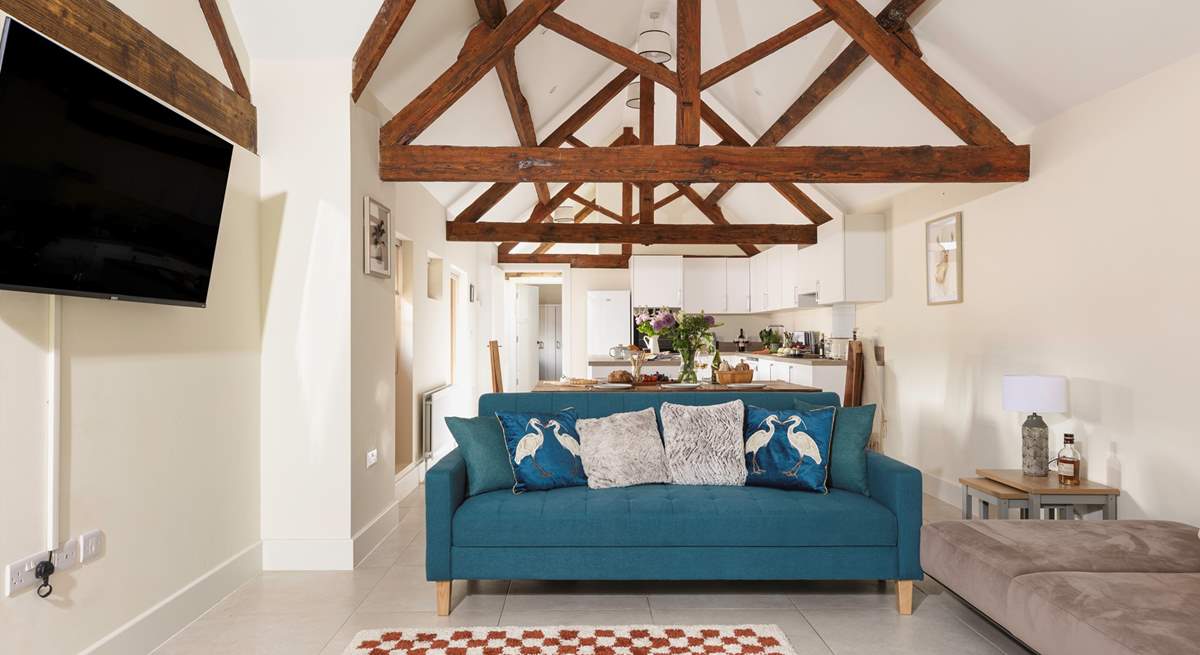 Open plan styling with original beams.