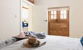 This lovely en suite double bedroom lets the sun shine in. - Thumbnail Image