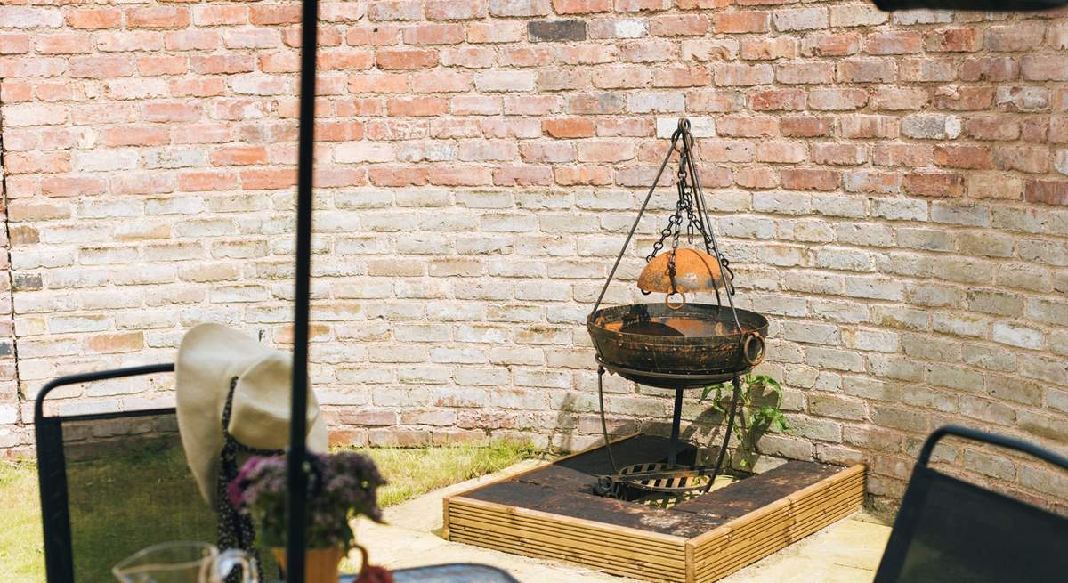 Cook up a storm on the fire-pit barbecue.