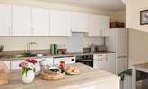 Plenty of room in the contemporary kitchen.  - Thumbnail Image