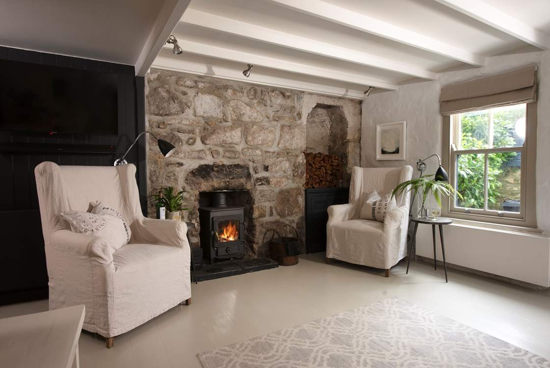 The sitting area is stylishly furnished with cosy interiors and is the perfect spot to unwind.