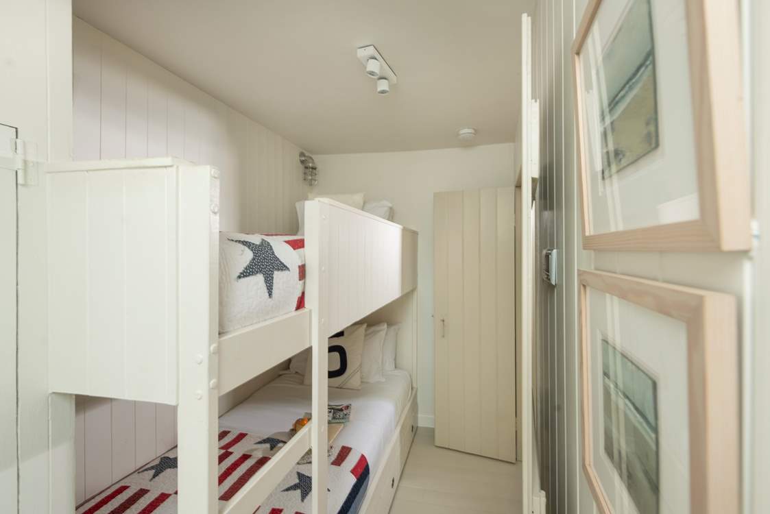 Cosy bedroom two also continues the nautical theme.