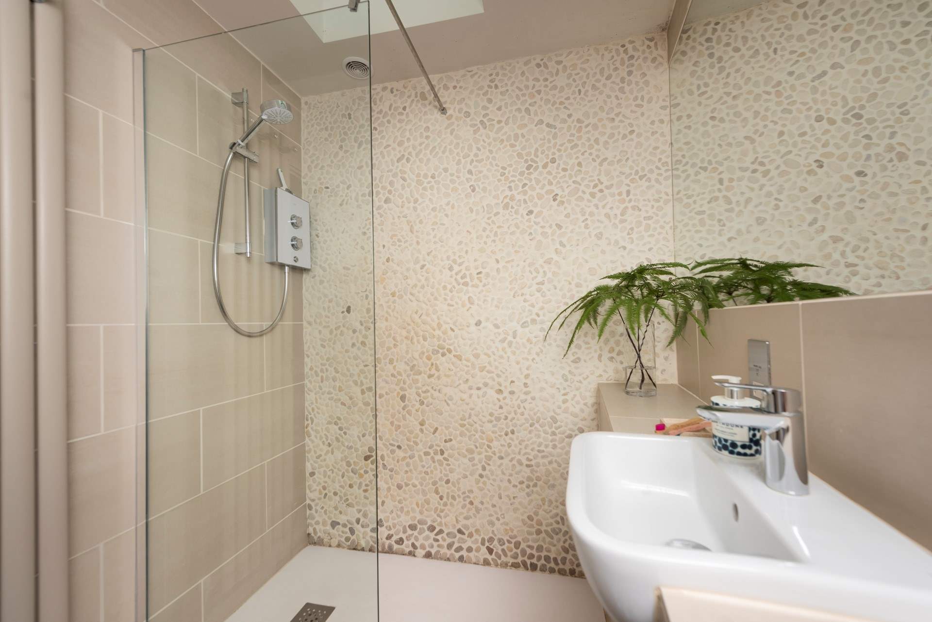 Wash away sandy toes and salty hair in the walk-in shower.