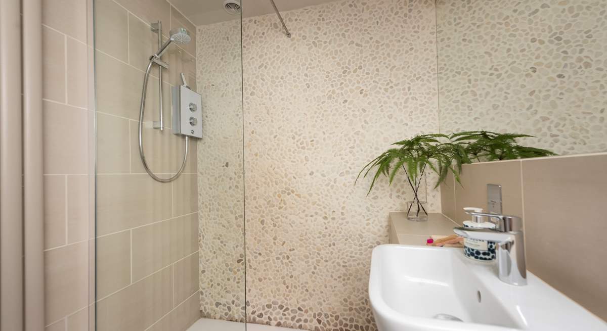 Wash away sandy toes and salty hair in the walk-in shower.