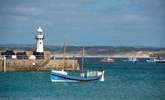 Venture down to the harbour and watch the fishing boats bobbing away.  - Thumbnail Image