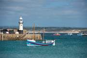 Venture down to the harbour and watch the fishing boats bobbing away.