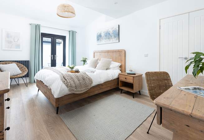 Bedroom one with a beautiful and comfy king-size double bed.
