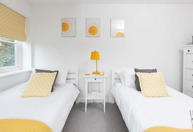 Bedroom two has twin beds. 