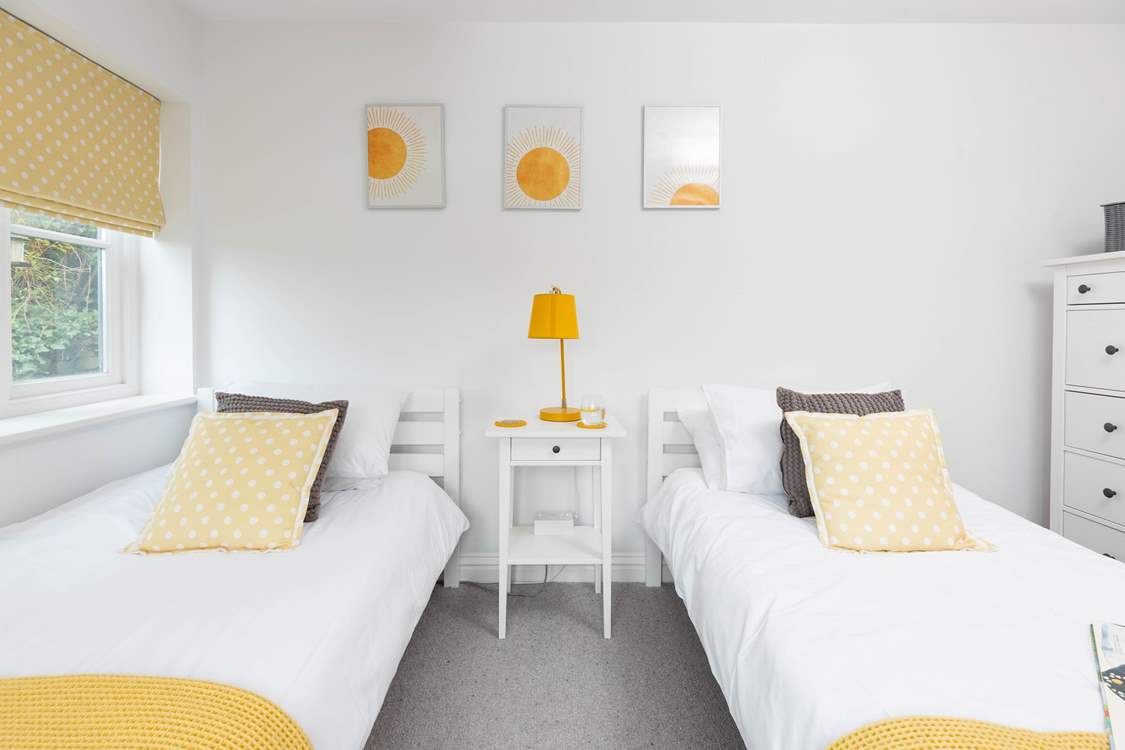 Bedroom two has twin beds.