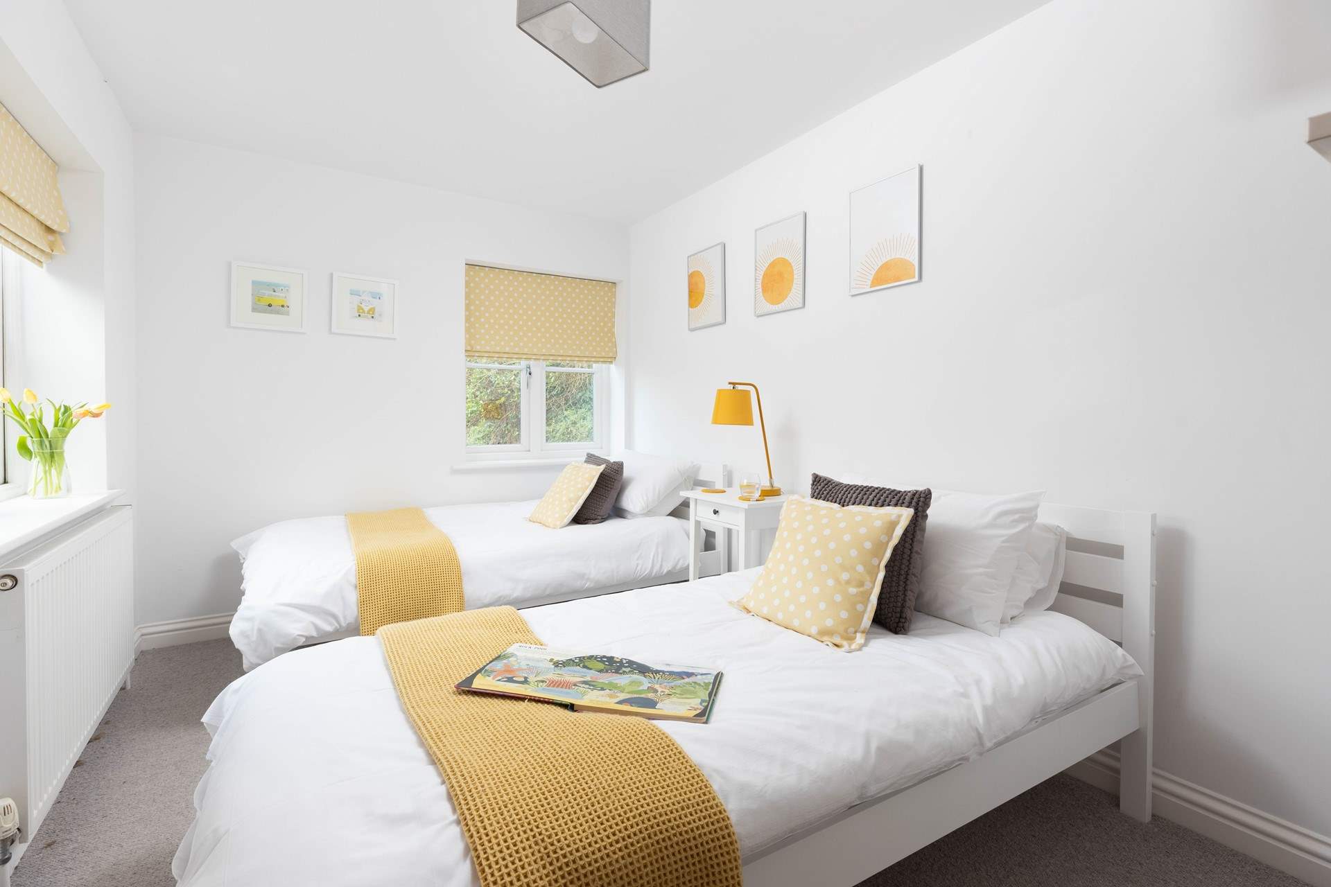 Lovely bedroom two is furnished with twin single beds, ideal for adults or the younger ones.