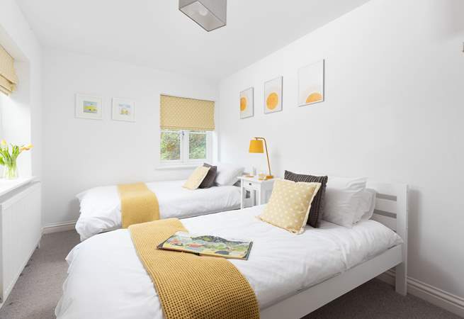 Lovely bedroom two is furnished with twin single beds, ideal for adults or the younger ones.