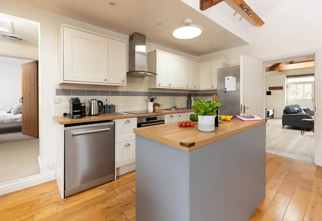 There is one step from the kitchen to bedrooms two and three. 