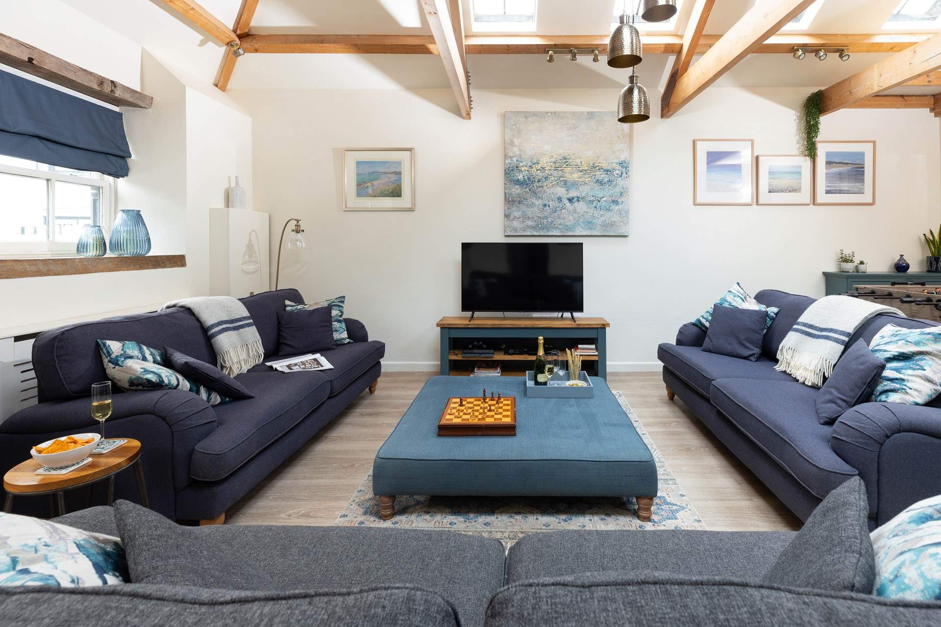 The sitting-room is a wonderfully sociable space with comfy sofas for everyone.