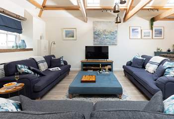 The sitting-room is a wonderfully sociable space with comfy sofas for everyone.