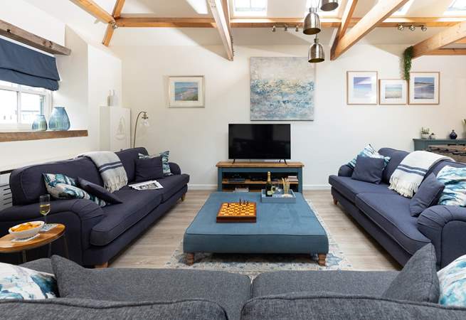 The sitting-room is a wonderfully sociable space with comfy sofas for everyone.