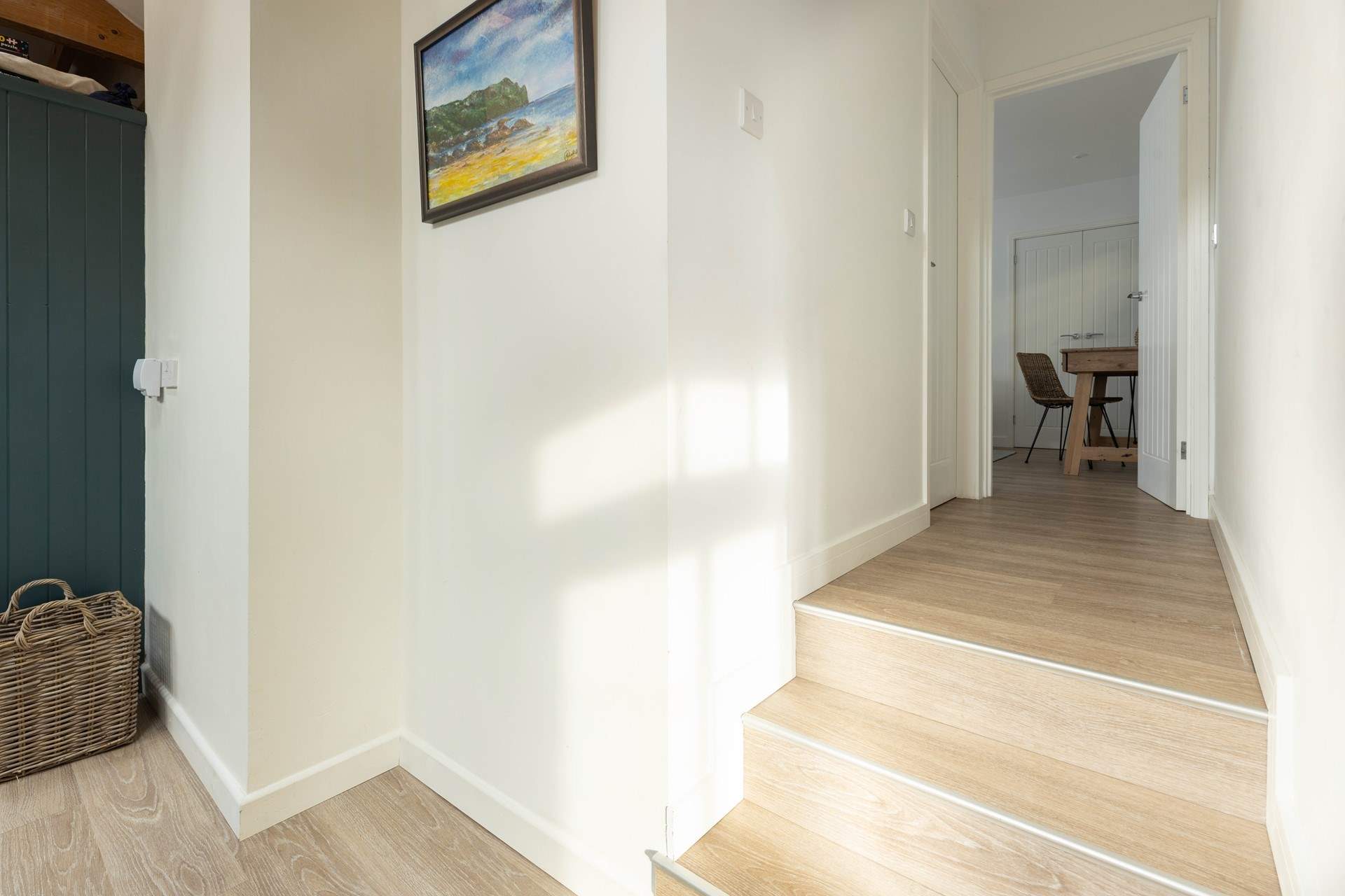 Take three steps up from the sitting-room to bedroom one. 