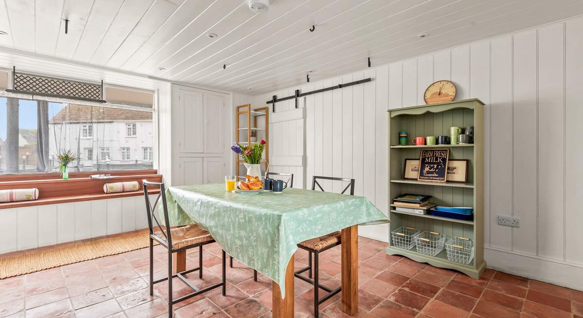 The kitchen/dining area has wonderful views out into the square. 