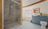 Down a few steps from bedroom one you will find its fabulous en suite shower-room. - Thumbnail Image