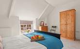 Bedroom three has a double bed which overlooks the courtyard. - Thumbnail Image