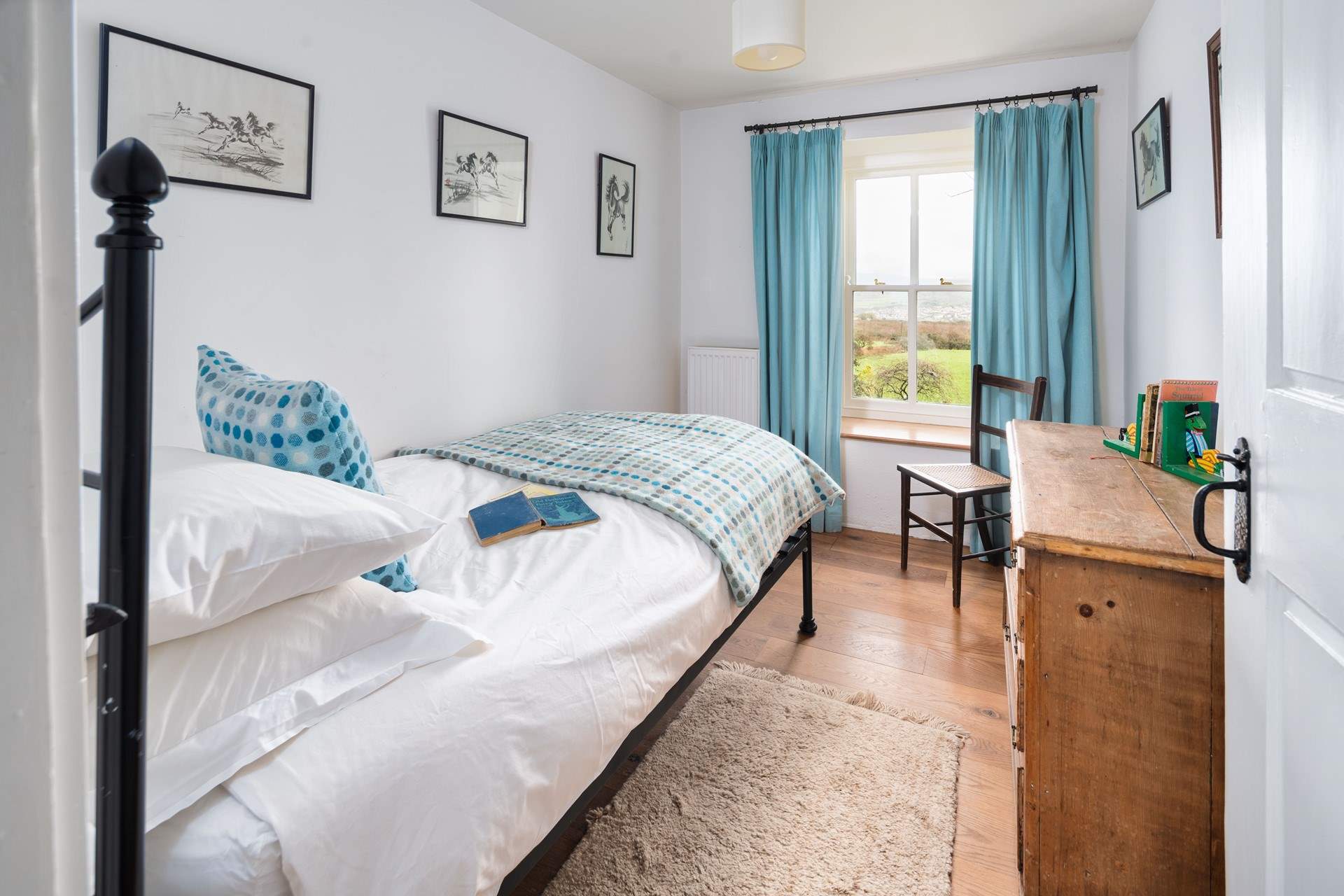 Pretty blues and views in the sweet single room on the first floor. 