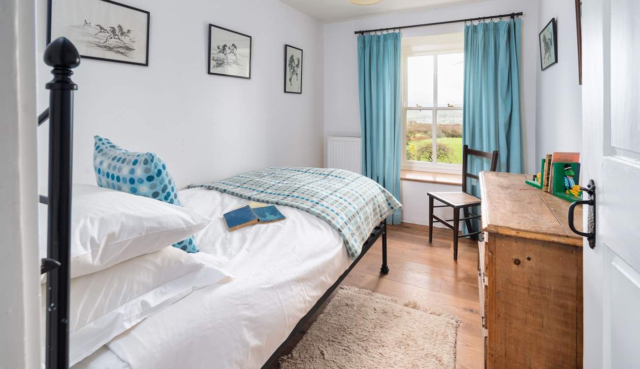 Pretty blues and views in the sweet single room on the first floor. 