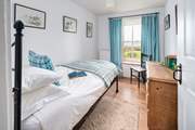 Pretty blues and views in the sweet single room on the first floor.